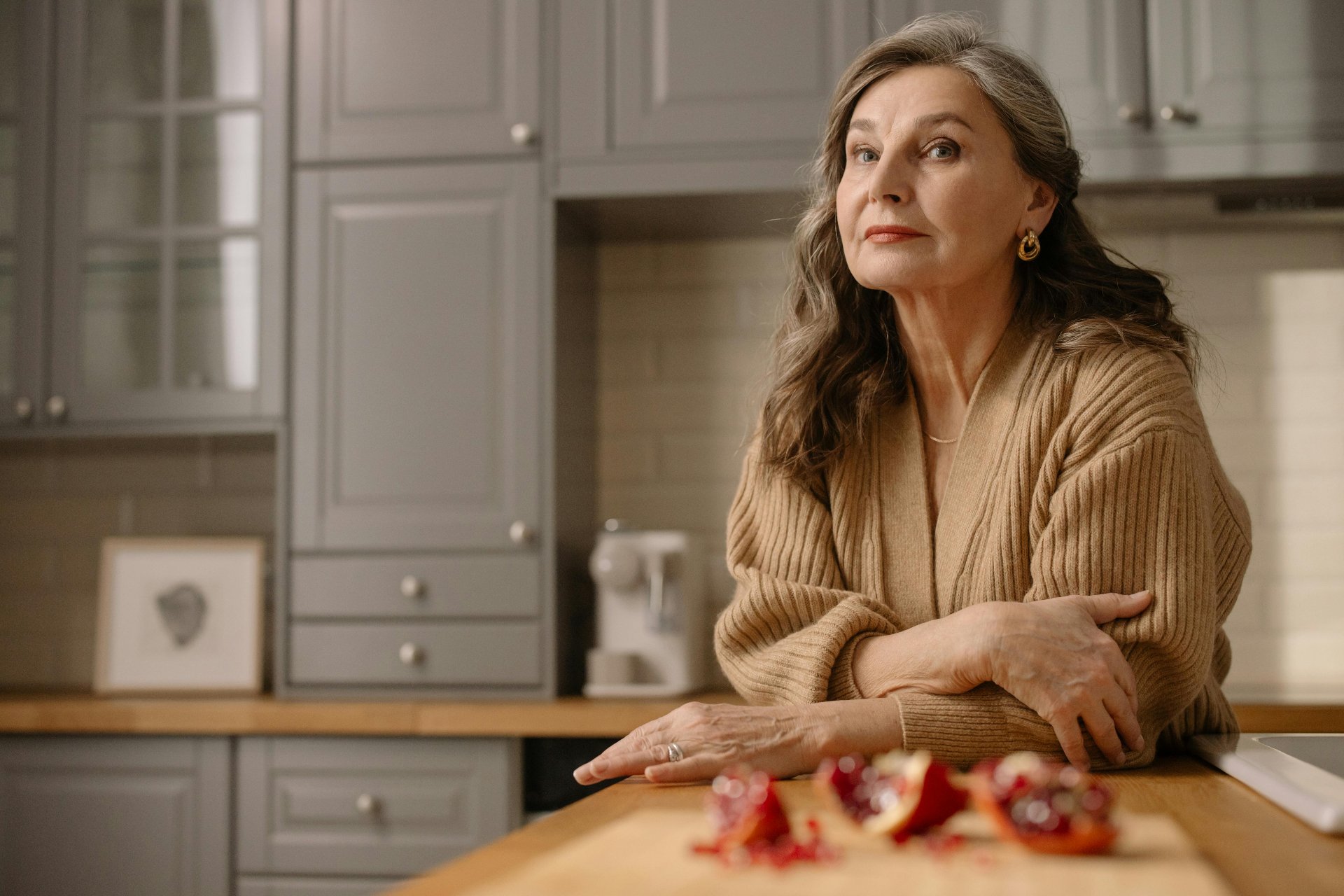 A woman settled at home in warm natural light
